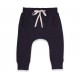 Navy blue jogging pants with a sarouel shape. Made from 100% pure coton jersey. Elasticated waist and cotton twill band