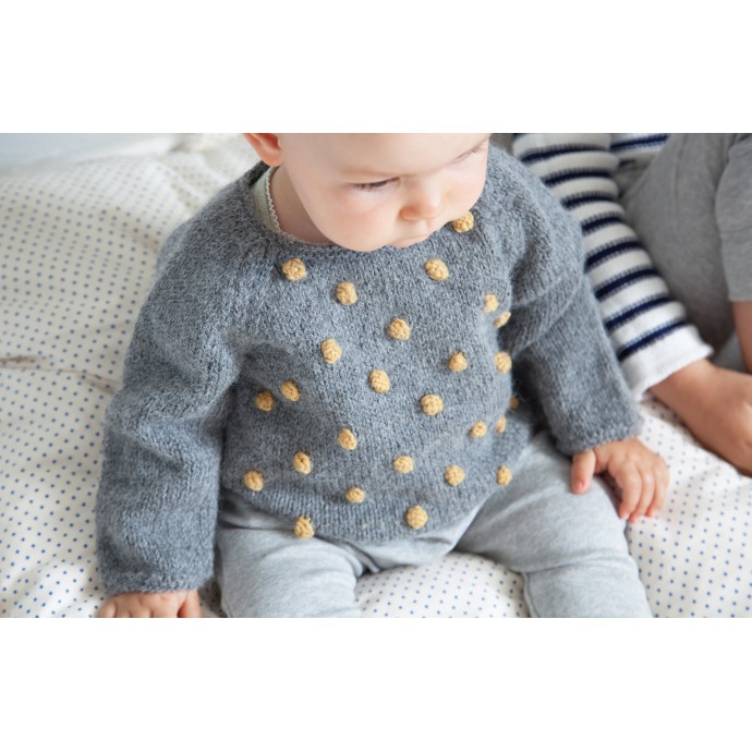 Eugène sweater worn (grey color with knitted honey colored bobbles)